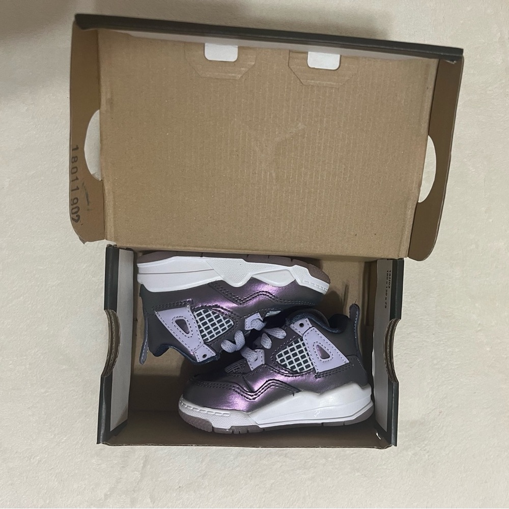 Jordan’s Retro 4 baby girl size 4C Monsoon Blue